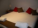 104-master bedroom with king bed.JPG